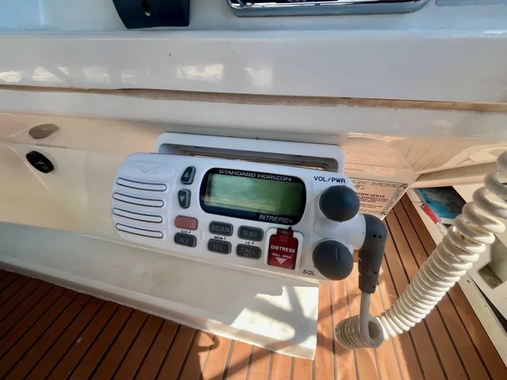  Yacht Photos Pics Marine radio on a 2001 Carver 404 boat, featuring Standard Horizon Intrepid+ model.