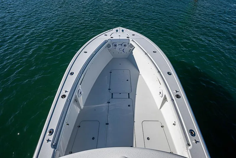  Yacht Photos Pics 2002 Yellowfin 36 Offshore boat deck on calm water.