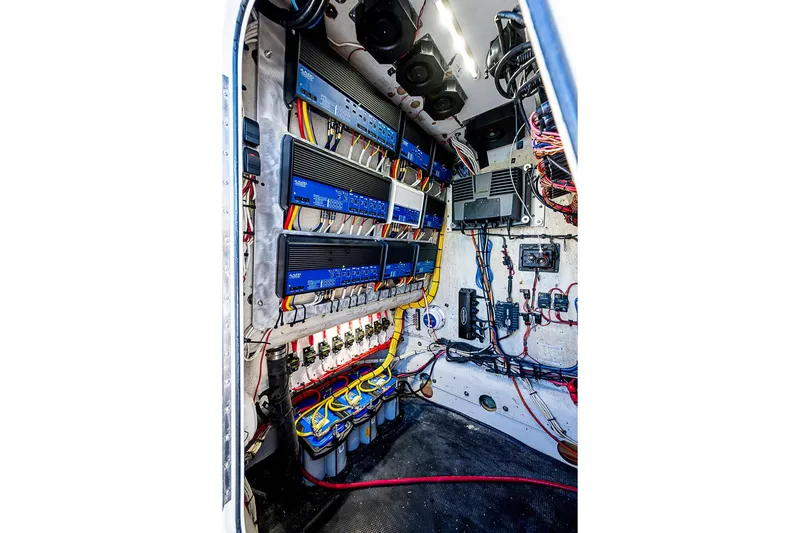  Yacht Photos Pics Electrical system inside a 2002 Yellowfin 36 Offshore boat, showcasing wiring and components.