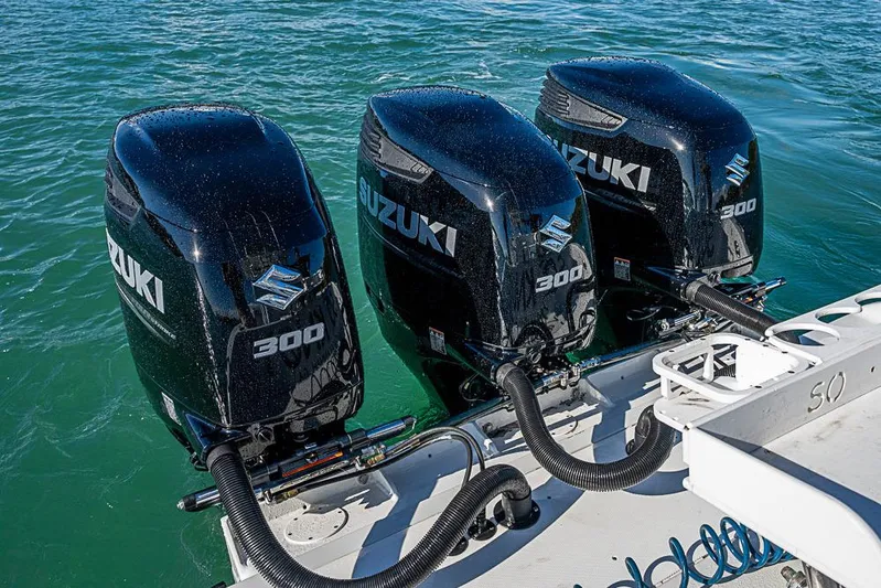  Yacht Photos Pics Triple Suzuki 300 outboard engines on a 2002 Yellowfin 36 Offshore boat.