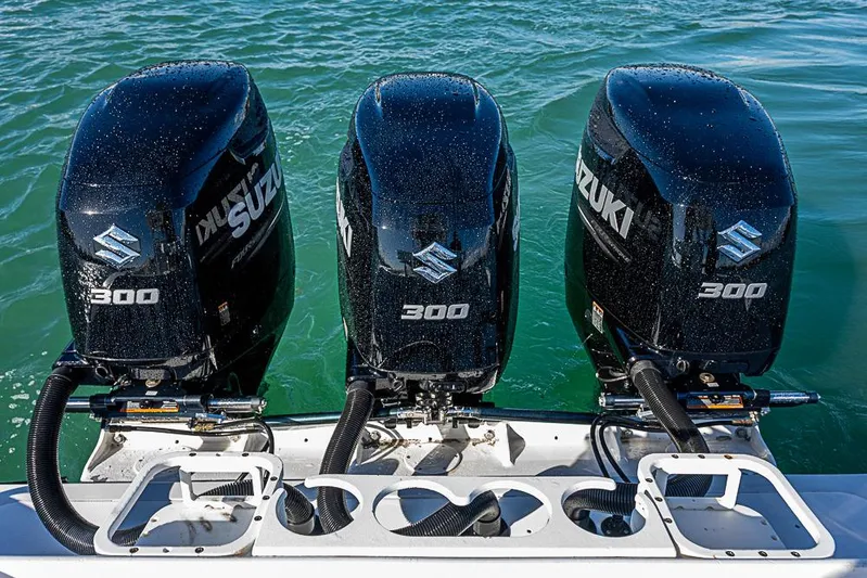  Yacht Photos Pics Triple Suzuki 300 outboard engines on a 2002 Yellowfin 36 Offshore boat.