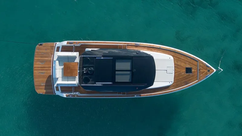 Grace Yacht Photos Pics 2023 Pardo Yachts GT52 luxury yacht on clear blue water, aerial view.