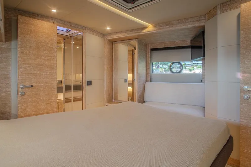 Grace Yacht Photos Pics Luxurious interior of 2023 Pardo Yachts GT52, featuring elegant bedroom design.