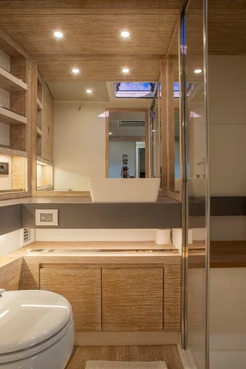 Grace Yacht Photos Pics Luxurious bathroom interior of 2023 Pardo Yachts GT52, featuring modern fixtures and wood accents.