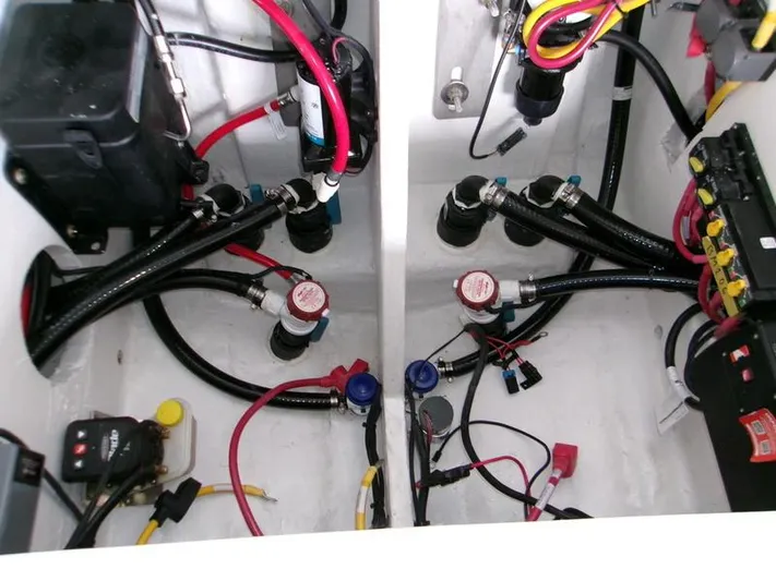  Yacht Photos Pics Electrical and plumbing systems inside a 2026 Blackfin 242 HB boat.