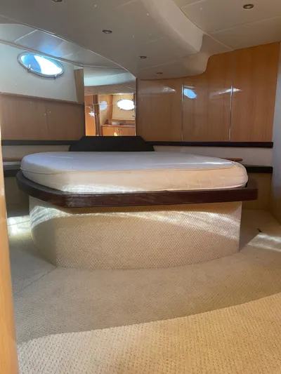 Yacht Photos Pics Luxurious interior of a 2008 Absolute 47 HT yacht with elegant wood paneling.