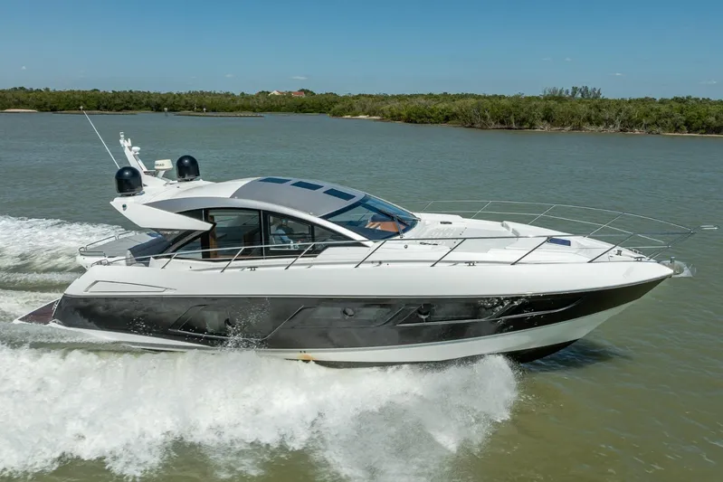 Midnight Oil Yacht Photos Pics 2018 Sunseeker Predator 57 yacht cruising on a sunny day.