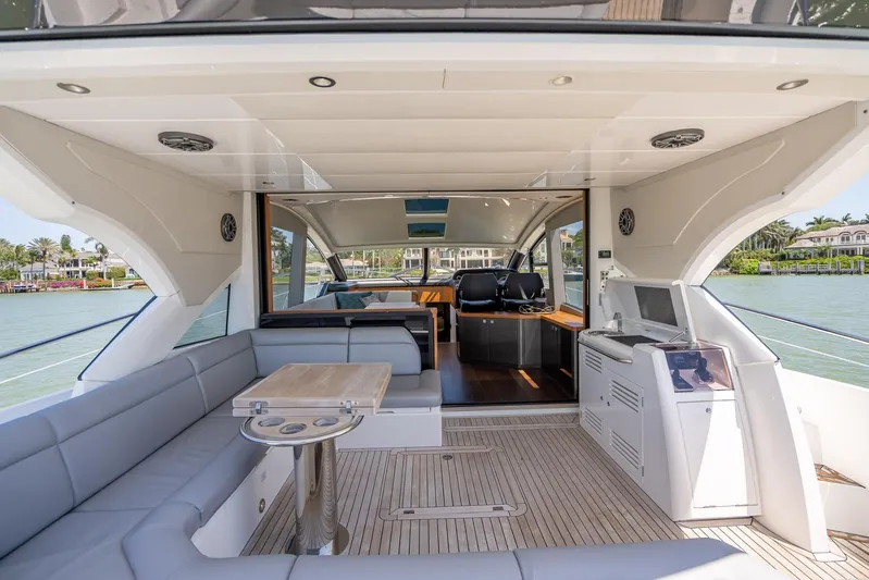 Midnight Oil Yacht Photos Pics Luxurious 2018 Sunseeker Predator 57 yacht interior with spacious seating and elegant design.