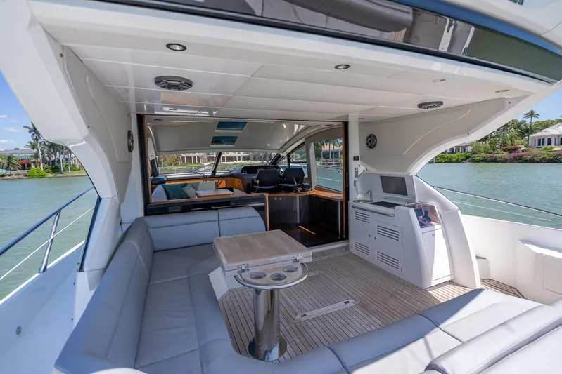 Midnight Oil Yacht Photos Pics Luxurious 2018 Sunseeker Predator 57 yacht interior with spacious seating and modern amenities.