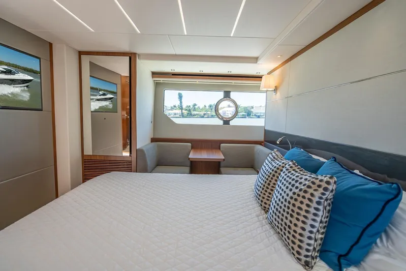 Midnight Oil Yacht Photos Pics Luxurious interior of 2018 Sunseeker Predator 57 yacht with elegant bedroom design.