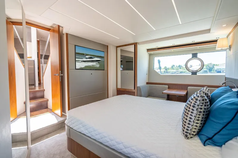 Midnight Oil Yacht Photos Pics Luxurious interior of 2018 Sunseeker Predator 57 yacht with modern bedroom design.