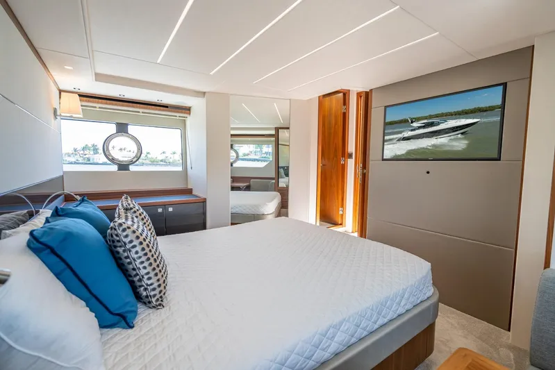 Midnight Oil Yacht Photos Pics Luxurious interior of 2018 Sunseeker Predator 57 yacht with elegant bedroom design.