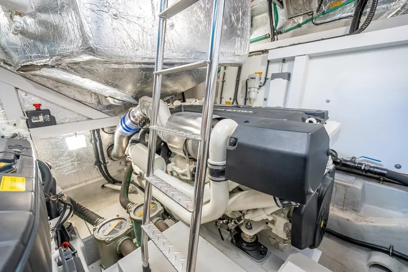 Midnight Oil Yacht Photos Pics Engine room of 2018 Sunseeker Predator 57 yacht, featuring advanced machinery and equipment.