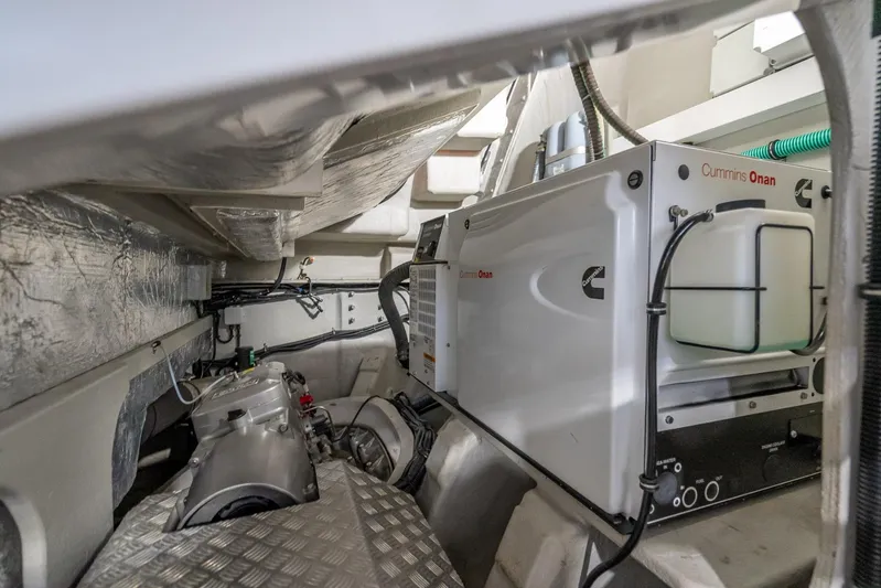 Midnight Oil Yacht Photos Pics Engine room of 2018 Sunseeker Predator 57 yacht featuring Cummins Onan generator.