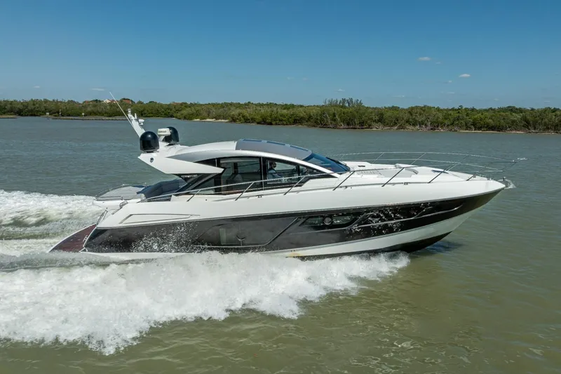 Midnight Oil Yacht Photos Pics 2018 Sunseeker Predator 57 yacht cruising on a sunny day.