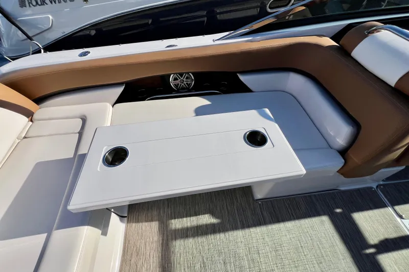  Yacht Photos Pics 2019 Four Winns Horizon H290 boat interior with seating and table.
