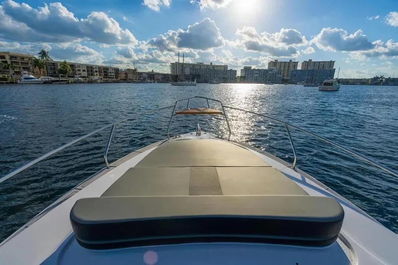  Yacht Photos Pics Luxurious Hanover 305 yacht cruising on a sunny day, 2025 model.