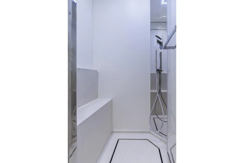  Yacht Photos Pics Modern shower area in 2026 Cranchi Sessantadue 62 yacht, featuring sleek design and fixtures.
