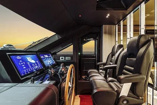  Yacht Photos Pics Luxurious 2026 Cranchi Sessantadue 62 yacht cockpit with modern controls and plush seating.