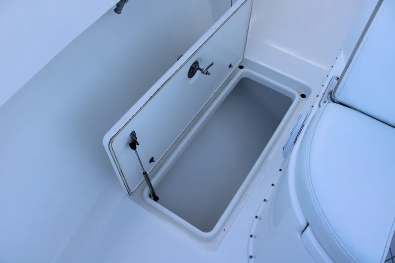  Yacht Photos Pics Open storage compartment on 1998 Venture 34 Open boat, showcasing interior space.