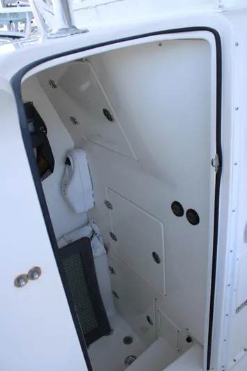  Yacht Photos Pics Interior view of 1998 Venture 34 Open boat cabin with storage compartments.