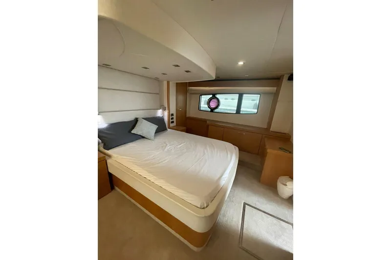 Yacht Photos Pics Luxurious bedroom interior of 2012 Sunseeker Manhattan 70 yacht with modern design.