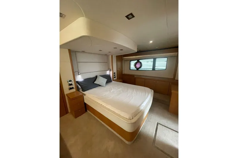  Yacht Photos Pics Luxurious bedroom interior of 2012 Sunseeker Manhattan 70 yacht with modern design.