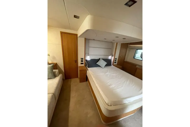  Yacht Photos Pics Luxurious bedroom interior of 2012 Sunseeker Manhattan 70 yacht with modern design.