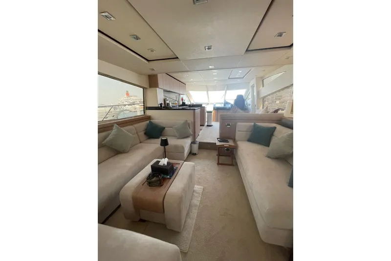  Yacht Photos Pics Luxurious interior of 2012 Sunseeker Manhattan 70 yacht with elegant seating and modern design.