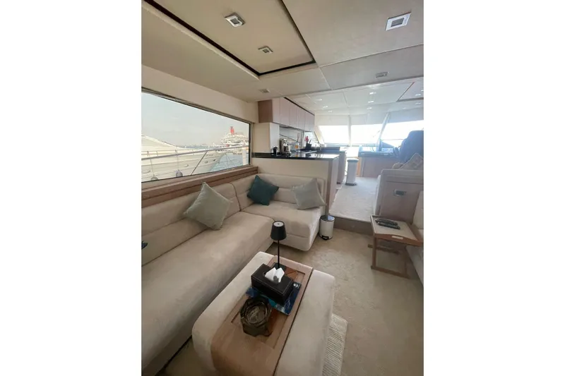  Yacht Photos Pics Luxurious interior of 2012 Sunseeker Manhattan 70 yacht with elegant seating and modern design.