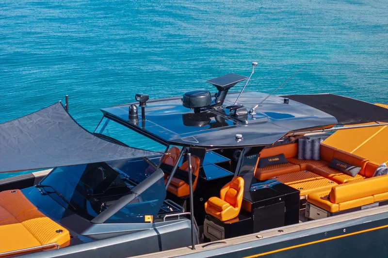 La Do&ntilde;a Yacht Photos Pics 2023 Pardo Yachts 50 with sleek design and vibrant orange seating on blue water.