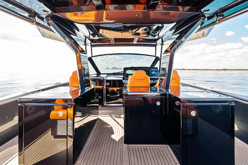 La Do&ntilde;a Yacht Photos Pics Luxurious 2023 Pardo Yachts 50 interior with sleek design and vibrant orange seating.
