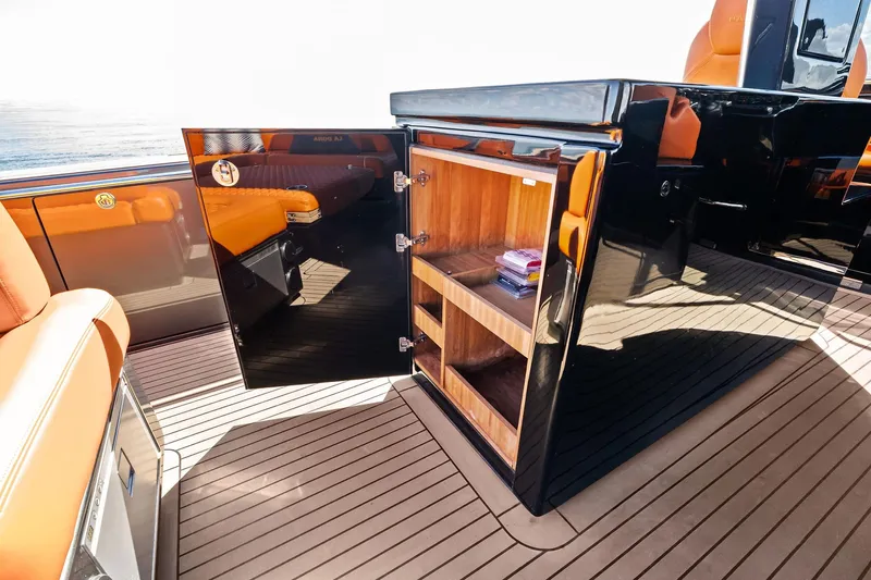 La Do&ntilde;a Yacht Photos Pics Luxurious interior of 2023 Pardo Yachts 50, featuring sleek cabinetry and elegant seating.