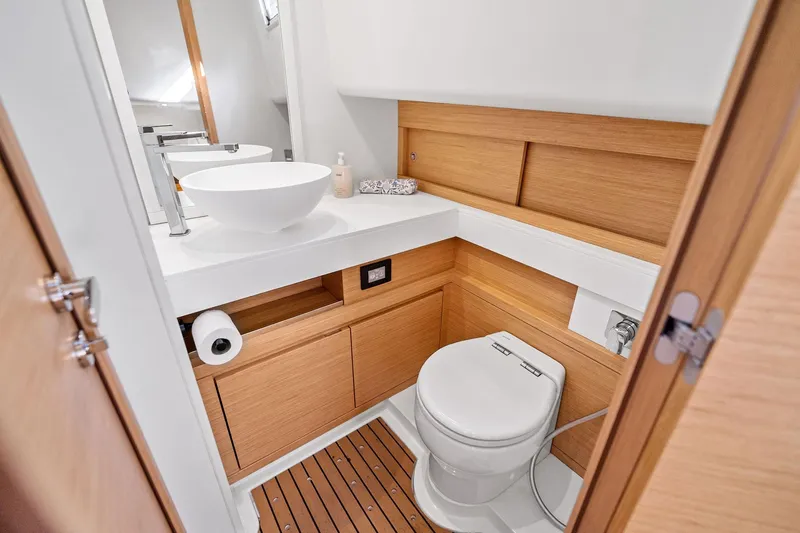 La Do&ntilde;a Yacht Photos Pics Luxurious bathroom in 2023 Pardo Yachts 50, featuring modern fixtures and wooden accents.