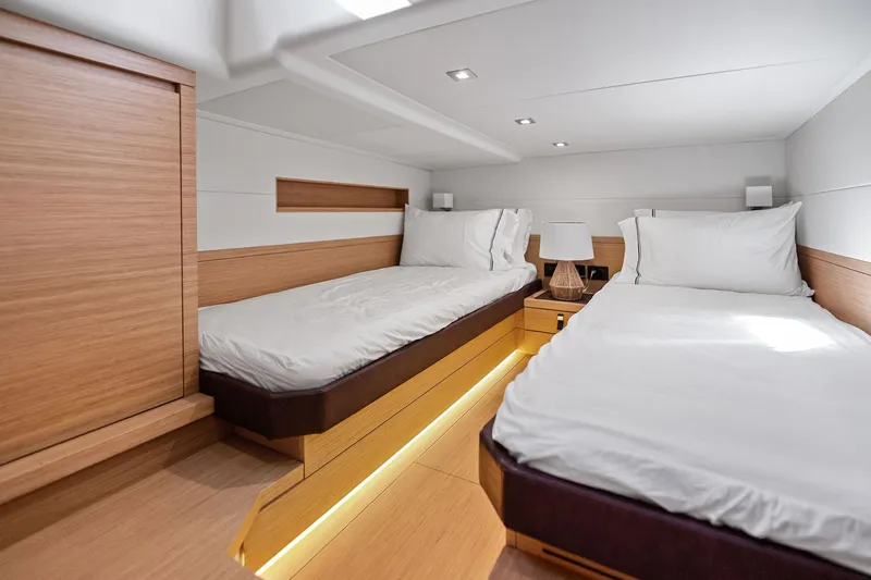 La Do&ntilde;a Yacht Photos Pics Luxurious cabin interior of 2023 Pardo Yachts 50 with twin beds and modern design.