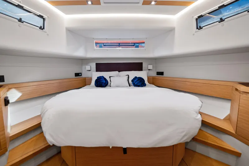 La Do&ntilde;a Yacht Photos Pics Luxurious cabin interior of 2023 Pardo Yachts 50, featuring a cozy bed and modern design.