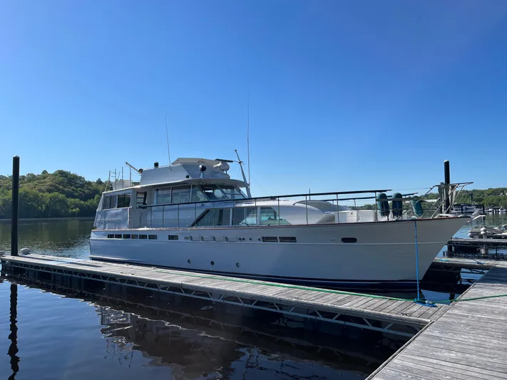  Yacht Photos Pics 1966 Chris-Craft 57 Constellation yacht docked on a sunny day.