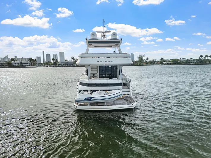 Live More Yacht Photos Pics Luxury 2021 Galeon 680 Fly yacht on water with city skyline background.