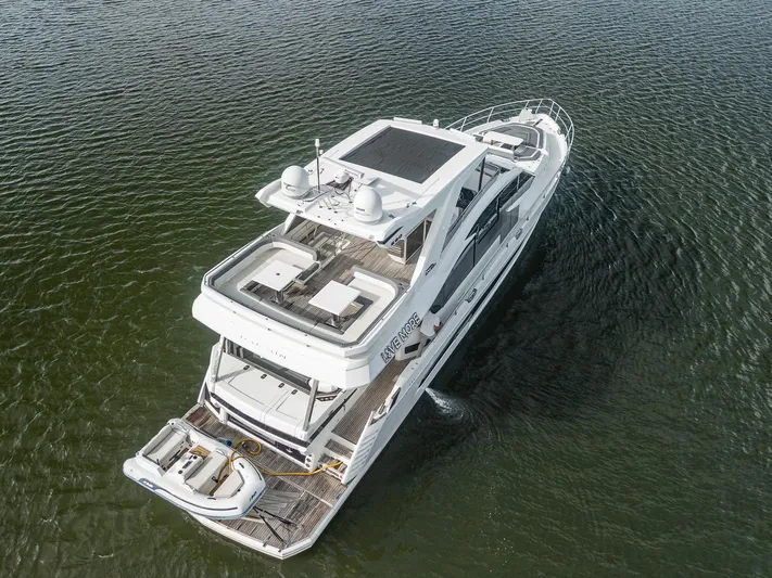 Live More Yacht Photos Pics Aerial view of 2021 Galeon 680 Fly yacht cruising on water.
