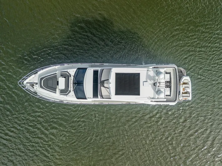 Live More Yacht Photos Pics Aerial view of 2021 Galeon 680 Fly yacht on calm water.