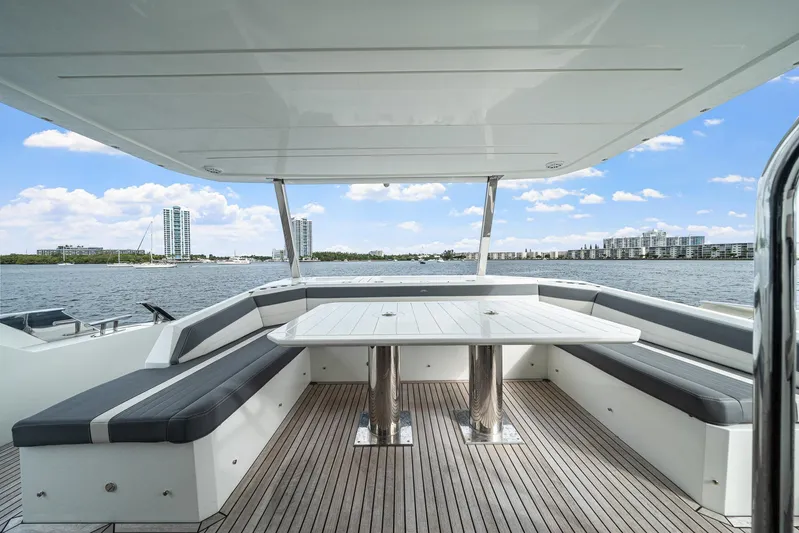 Live More Yacht Photos Pics Luxury seating area on 2021 Galeon 680 Fly yacht with scenic waterfront view.