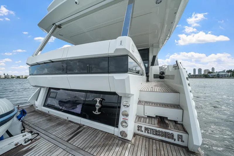 Live More Yacht Photos Pics 2021 Galeon 680 Fly yacht docked in St. Petersburg, FL, with modern design and wooden deck.