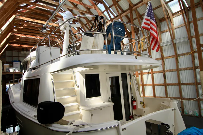  Yacht Photos Pics 2011 Fathom Element 43 yacht in a boathouse with American flag displayed.