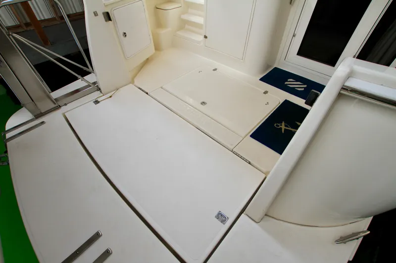  Yacht Photos Pics 2011 Fathom Element 43 yacht deck with storage compartments and non-slip mats.