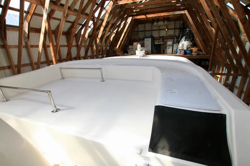  Yacht Photos Pics 2011 Fathom Element 43 boat in wooden storage shed.