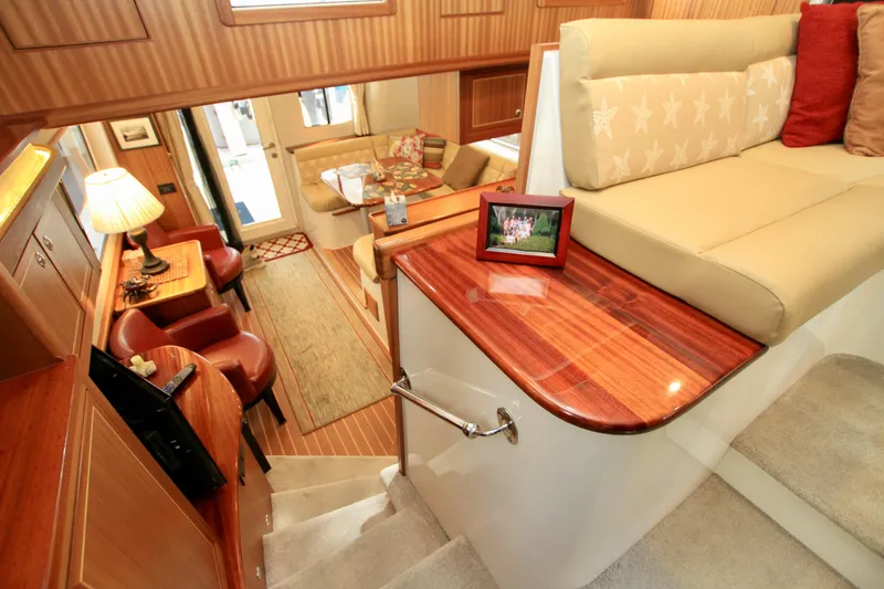  Yacht Photos Pics Luxurious interior of 2011 Fathom Element 43 yacht with elegant seating and decor.