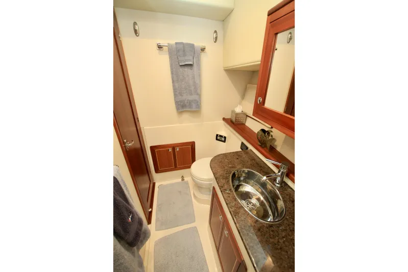  Yacht Photos Pics Luxurious bathroom in 2011 Fathom Element 43 yacht with modern fixtures and elegant design.