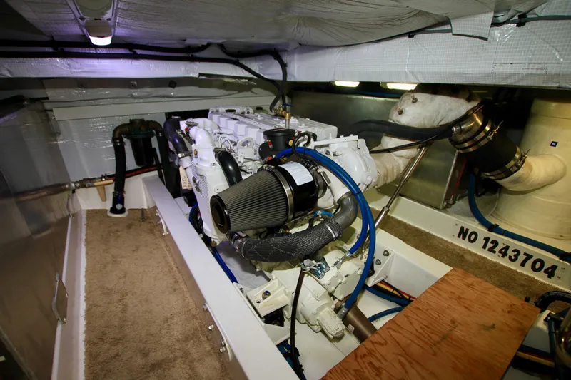  Yacht Photos Pics Engine room of 2011 Fathom Element 43 yacht, showcasing mechanical components and piping.