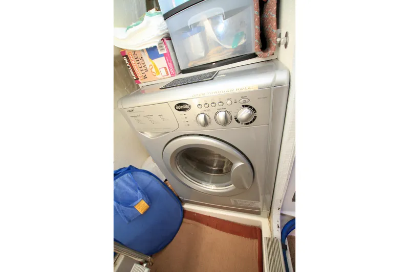  Yacht Photos Pics Silver washing machine in a compact laundry space, Fathom Element 43, 2011 model.