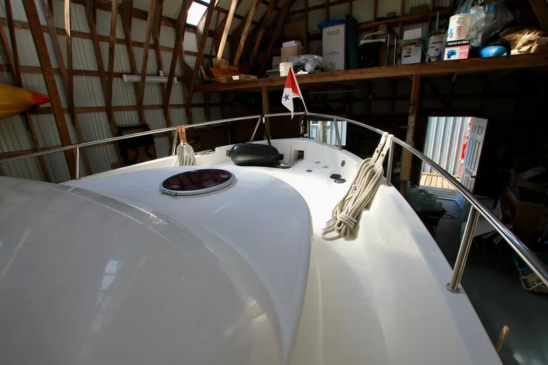  Yacht Photos Pics 2011 Fathom Element 43 boat in storage, featuring deck and nautical equipment.